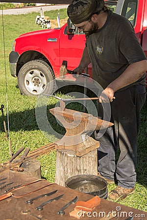 Blacksmith Creating Knives Editorial Stock Photo